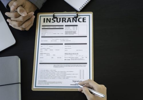 Male insurance agents are giving advice and signing a contract. In terms of insurance such as home, car, condo and health, various insurance ideas for modern life.